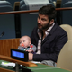 Clarke Gayford, partner to New Zealand Prime Minister Jacinda Ardern holds their baby Neve. REUTERS/Carlo Allegri